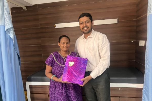 Dr. Jenit with patient